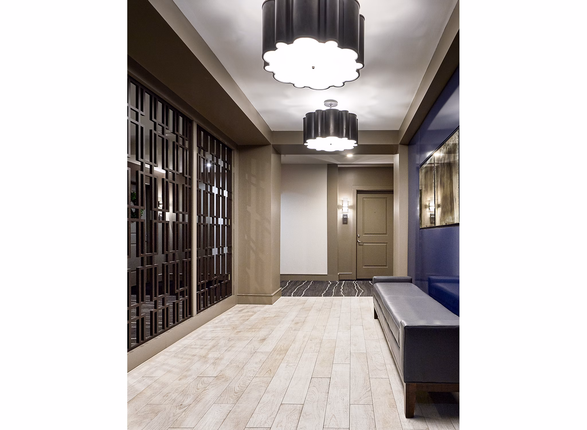 Contemporary hallway with elegant lighting at Solis SouthPark Apartments in Charlotte