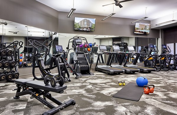 State-of-the-art fitness center with modern equipment at Solis SouthPark Apartments