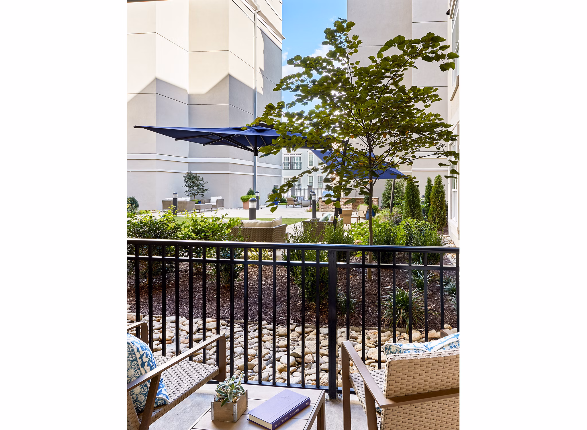 Balcony with modern furnishings at Solis SouthPark luxury apartments, ideal for relaxation and scenic views