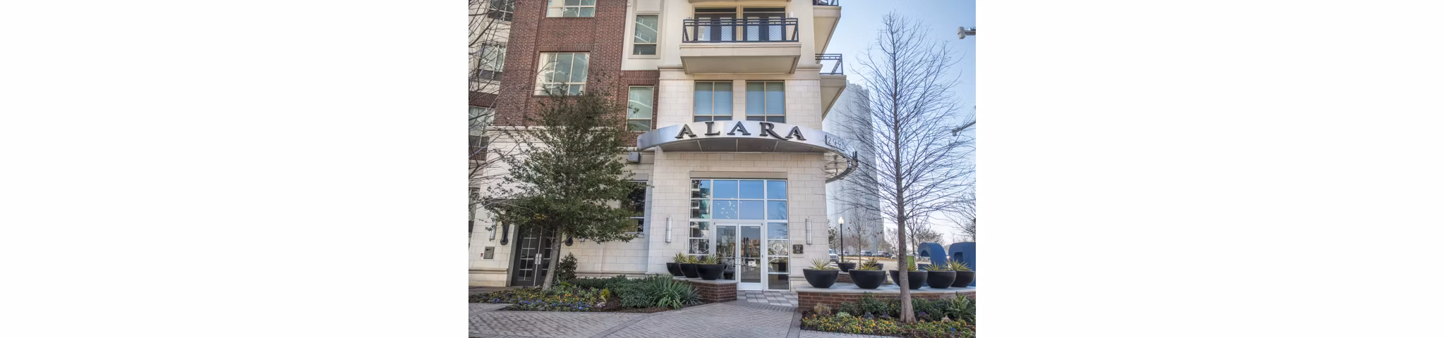 building/exterior at Alara Uptown Apartments