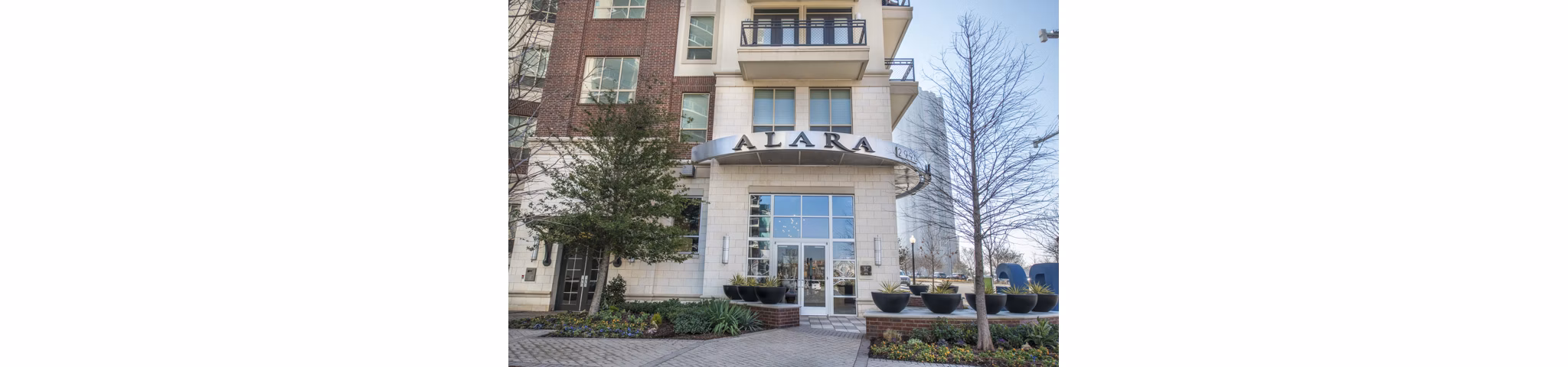 building/exterior at Alara Uptown Apartments