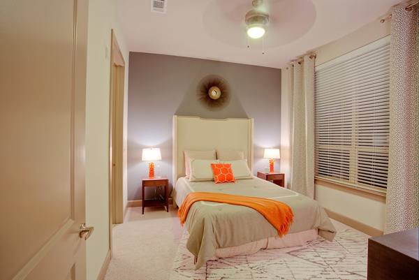 bedroom at Alara Uptown Luxury Apartments