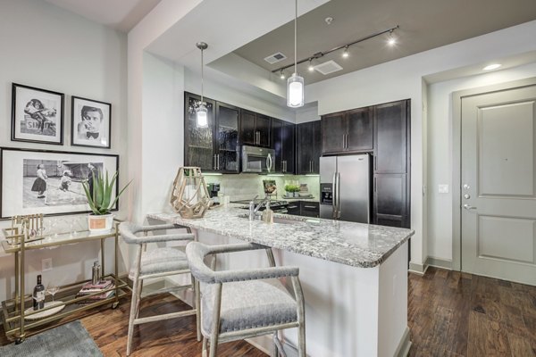 kitchen at Alara Uptown Apartments