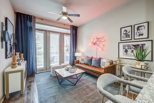 living room at Alara Uptown Apartments