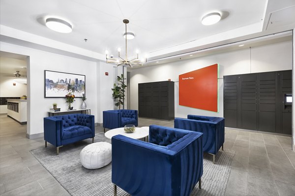 Modern clubhouse with elegant design at Burnet Flats Luxury Apartments in Austin featuring a spacious lounge and entertainment area