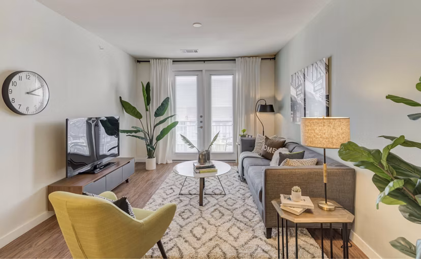 Spacious living room with modern decor at Burnet Flats Luxury Apartments