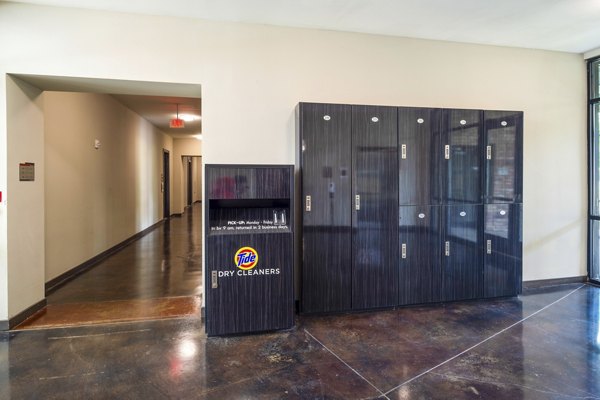 Game room featuring billiards and lounge seating at Elan Med Center Apartments, offering an entertainment space for residents