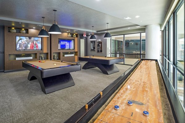 clubhouse game room at Elan Med Center Apartments