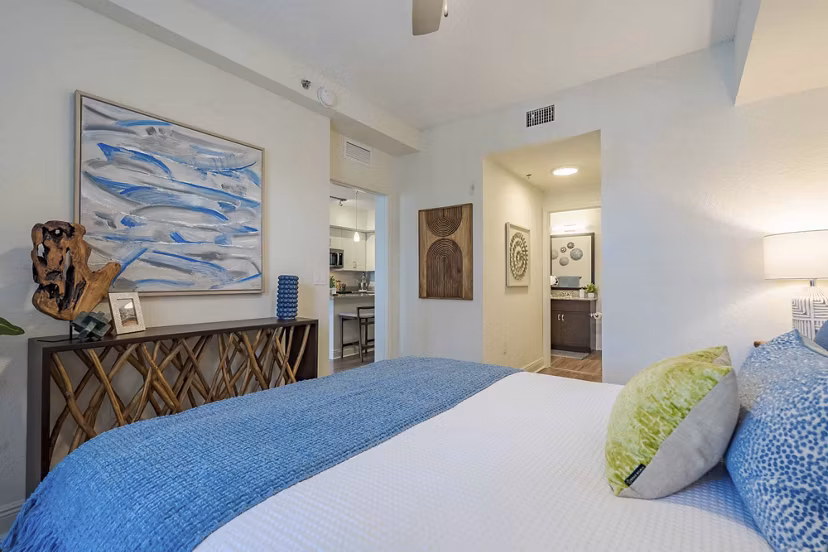 Cozy bedroom with modern decor at 2 Bayshore Apartments