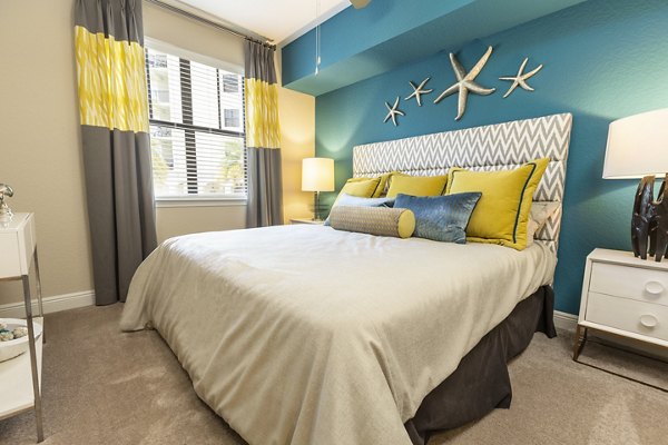 Cozy bedroom with modern decor at 2 Bayshore Apartments