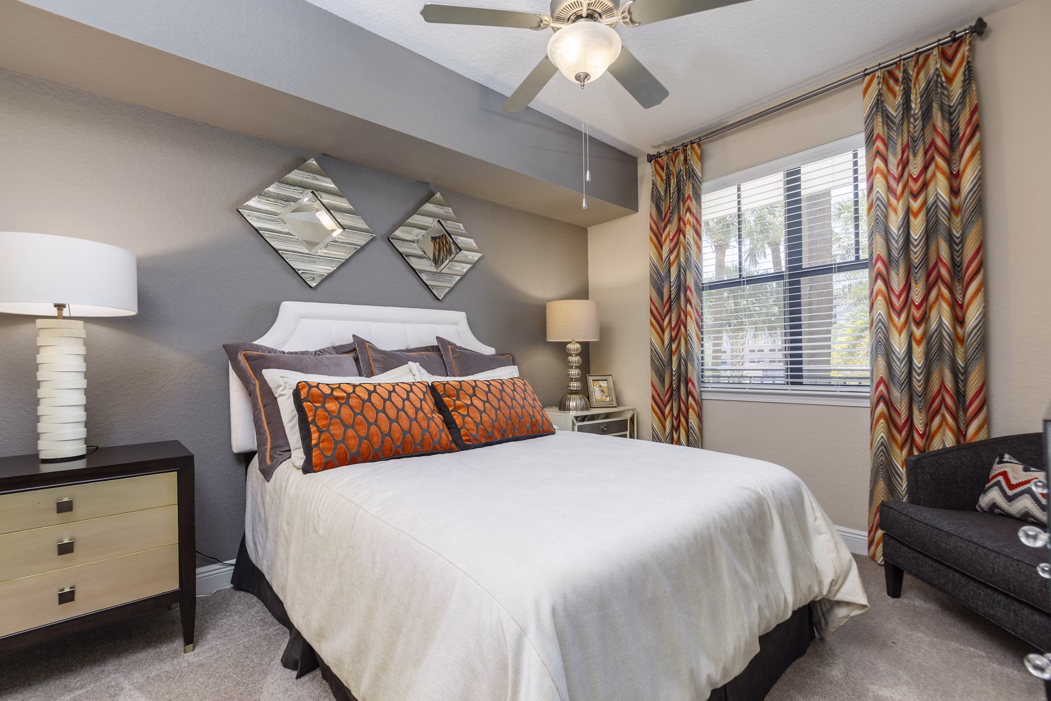Elegant bedroom with modern furnishings in 2 Bayshore Apartments, showcasing luxury living in a serene environment