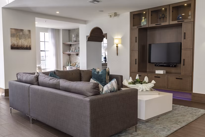 Modern clubhouse with sleek furnishings at 2 Bayshore Apartments in luxury Greystar community