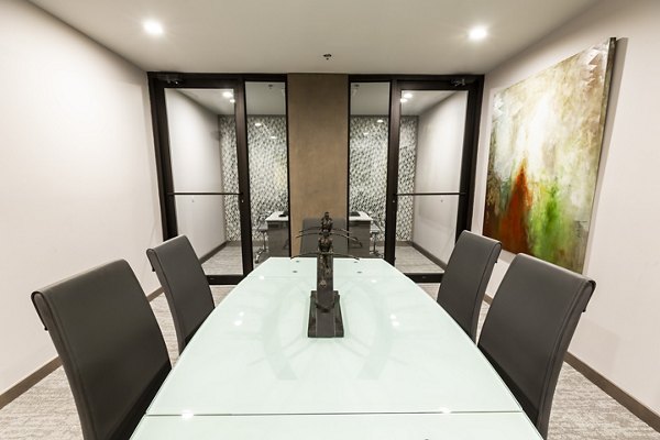 Modern meeting facility at 2 Bayshore Apartments with sleek furnishings and advanced technology setup