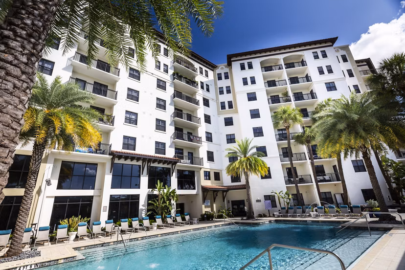 Luxurious pool area at 2 Bayshore Apartments offering relaxation and scenic views for residents