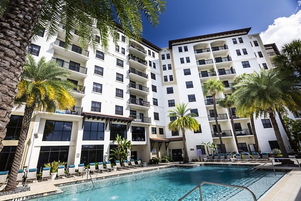 Luxurious pool area at 2 Bayshore Apartments offering relaxation and scenic views for residents