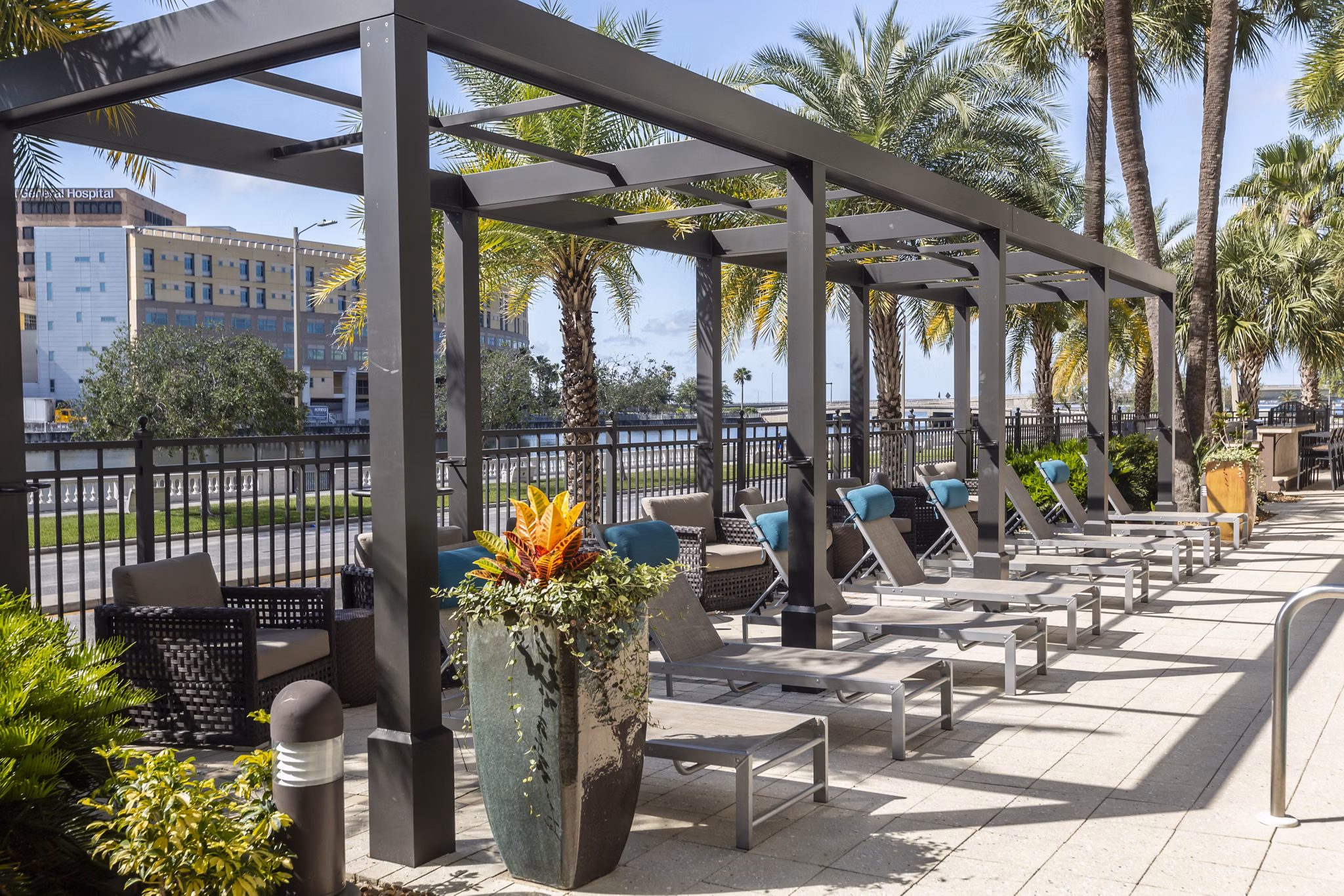 2 Bayshore Apartments: Scenic patio with outdoor seating and bay views