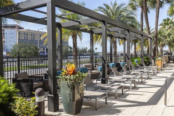 2 Bayshore Apartments: Scenic patio with outdoor seating and bay views