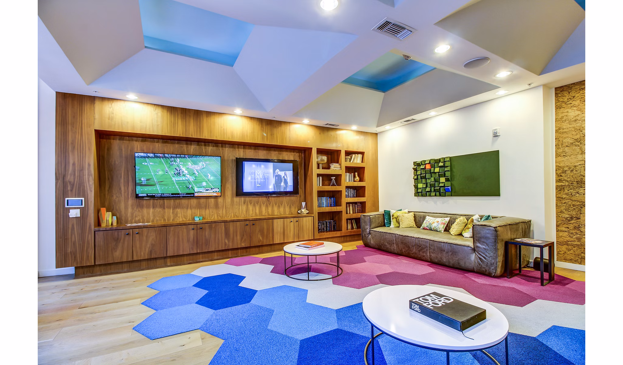 Lobby with sleek seating and modern decor at Elan East Apartments, a luxury clubhouse perfect for relaxation and social gatherings