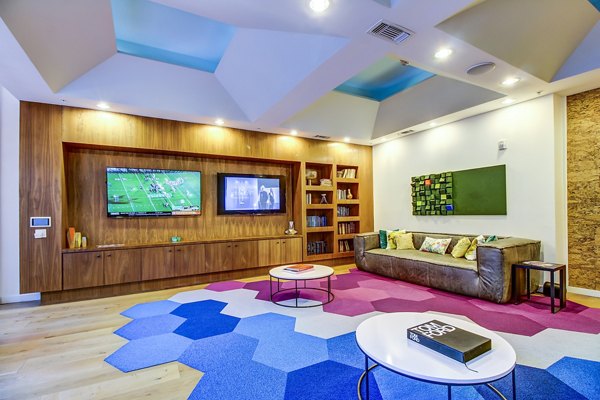 Lobby with sleek seating and modern decor at Elan East Apartments, a luxury clubhouse perfect for relaxation and social gatherings