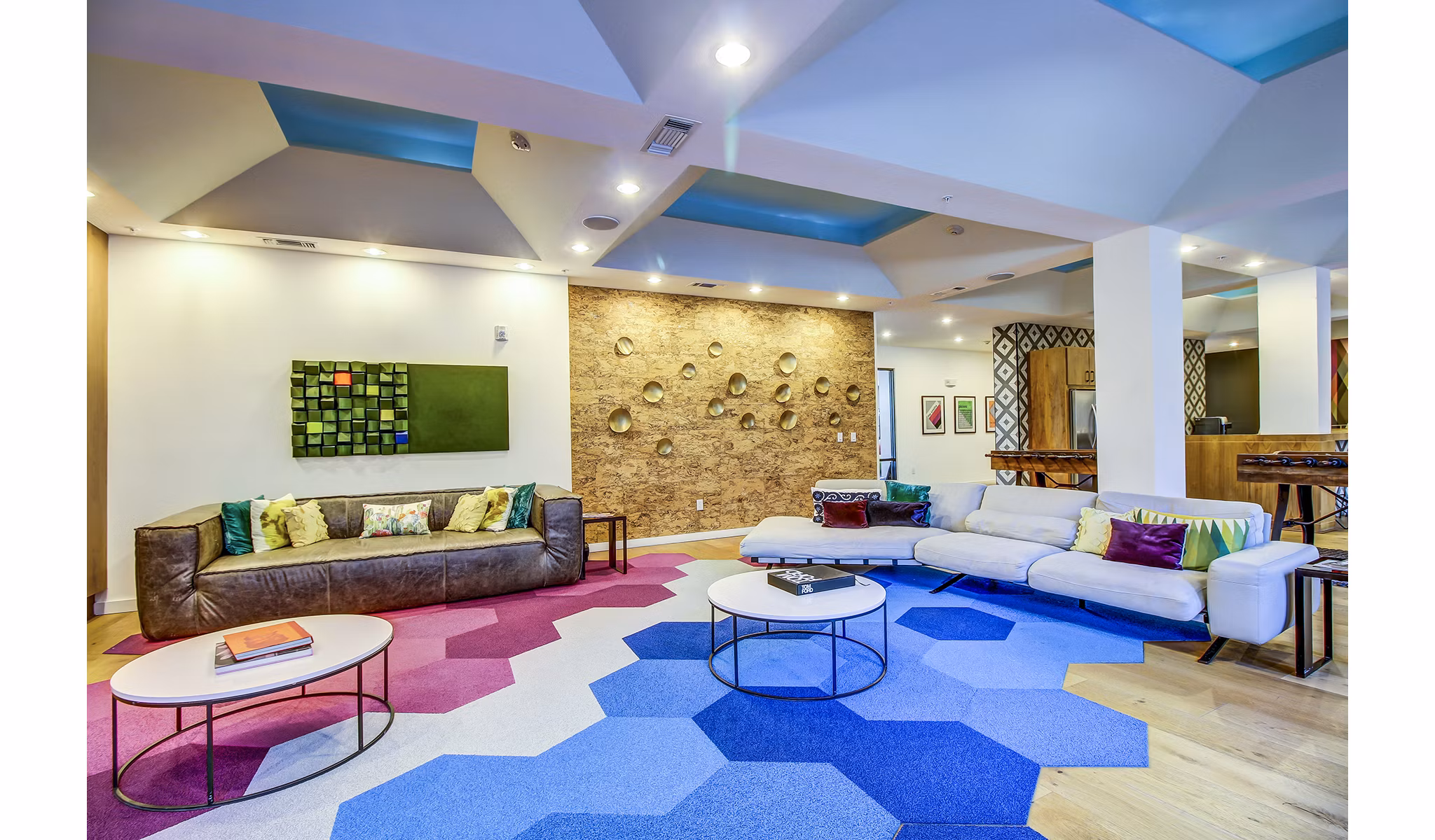 Clubhouse lobby featuring modern design and lounge seating at Elan East Apartments