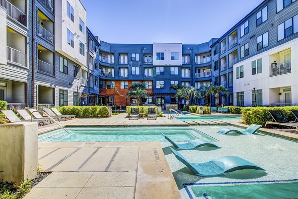 Resort-style swimming pool at Elan East Apartments offering a luxurious outdoor retreat for residents