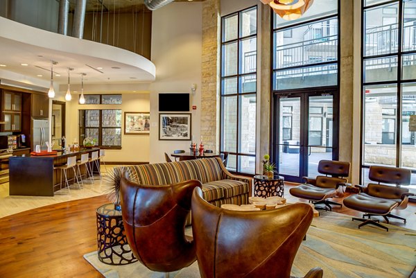 Elegant clubhouse with modern seating and decor at Coldwater Luxury Apartments