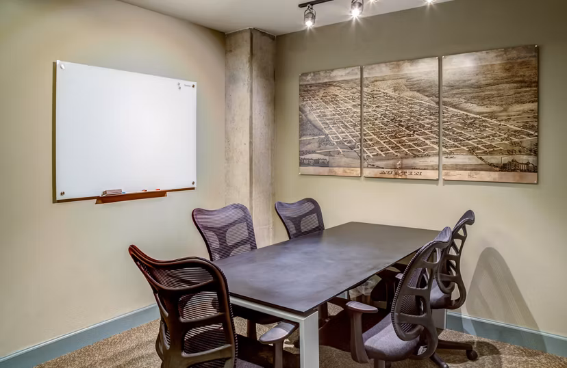 Modern clubhouse with cozy seating at Coldwater Luxury Apartments in upscale neighborhood