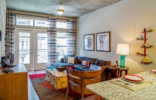 Spacious living room with modern decor at Coldwater Luxury Apartments