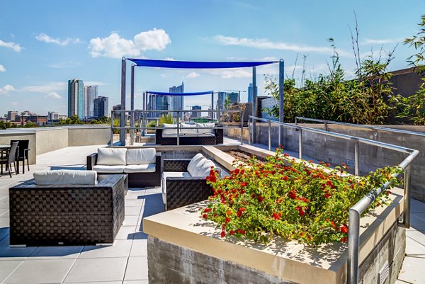 Expansive recreational area at Coldwater Luxury Apartments with modern seating and leisure spaces for residents to enjoy