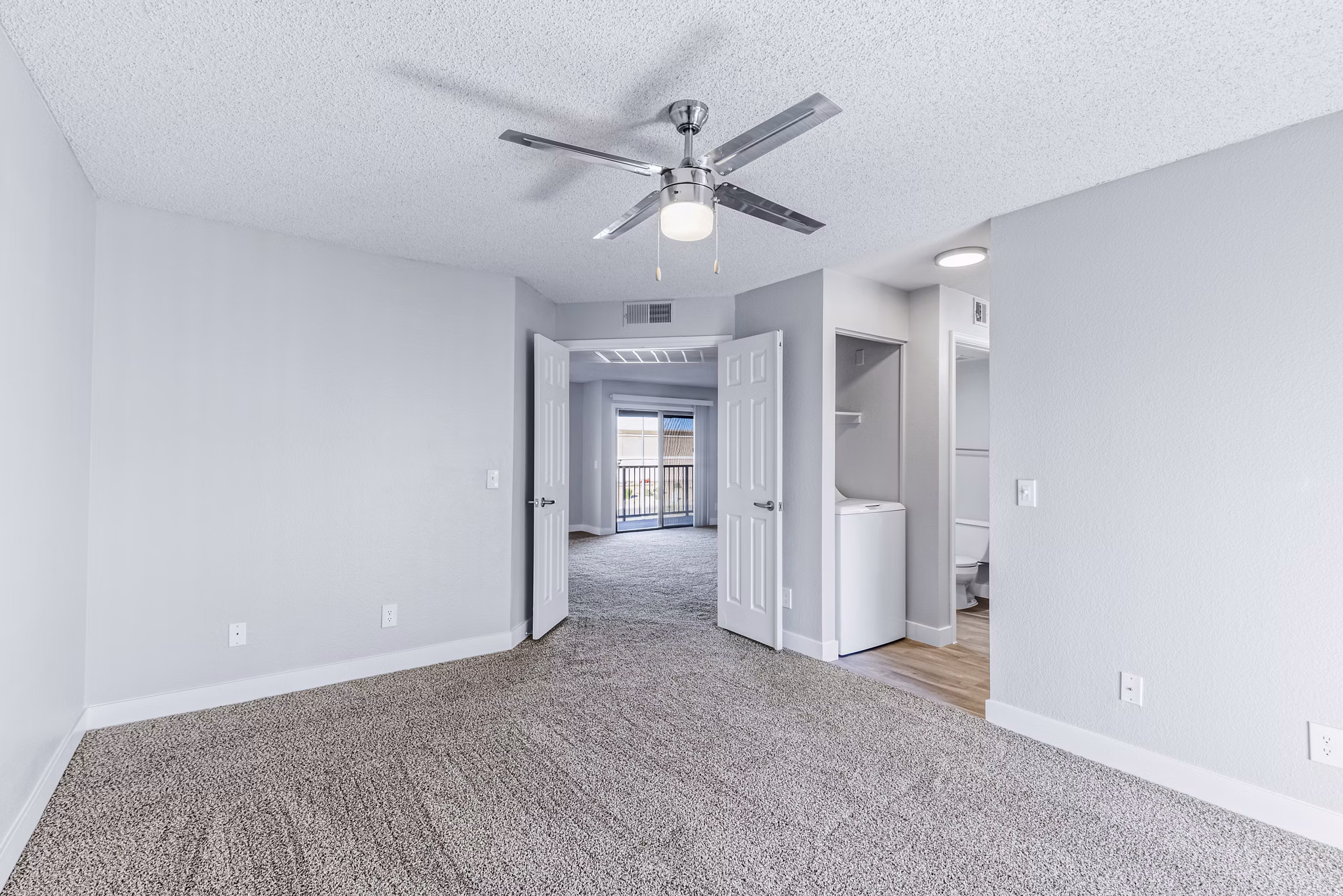 Luxurious bedroom with elegant decor at Fountain Palms Apartments, offering comfort and style in every detail