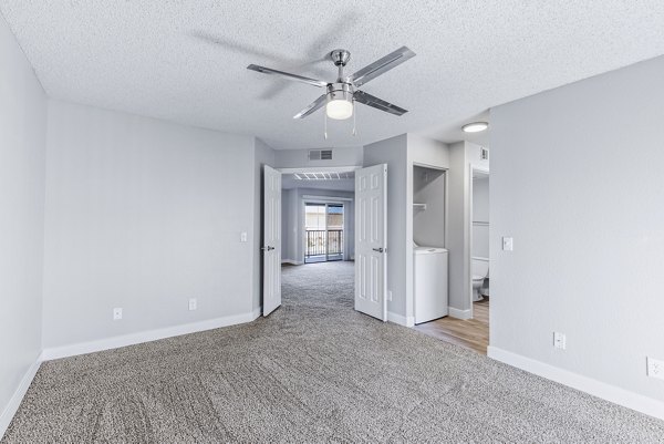 Luxurious bedroom with elegant decor at Fountain Palms Apartments, offering comfort and style in every detail