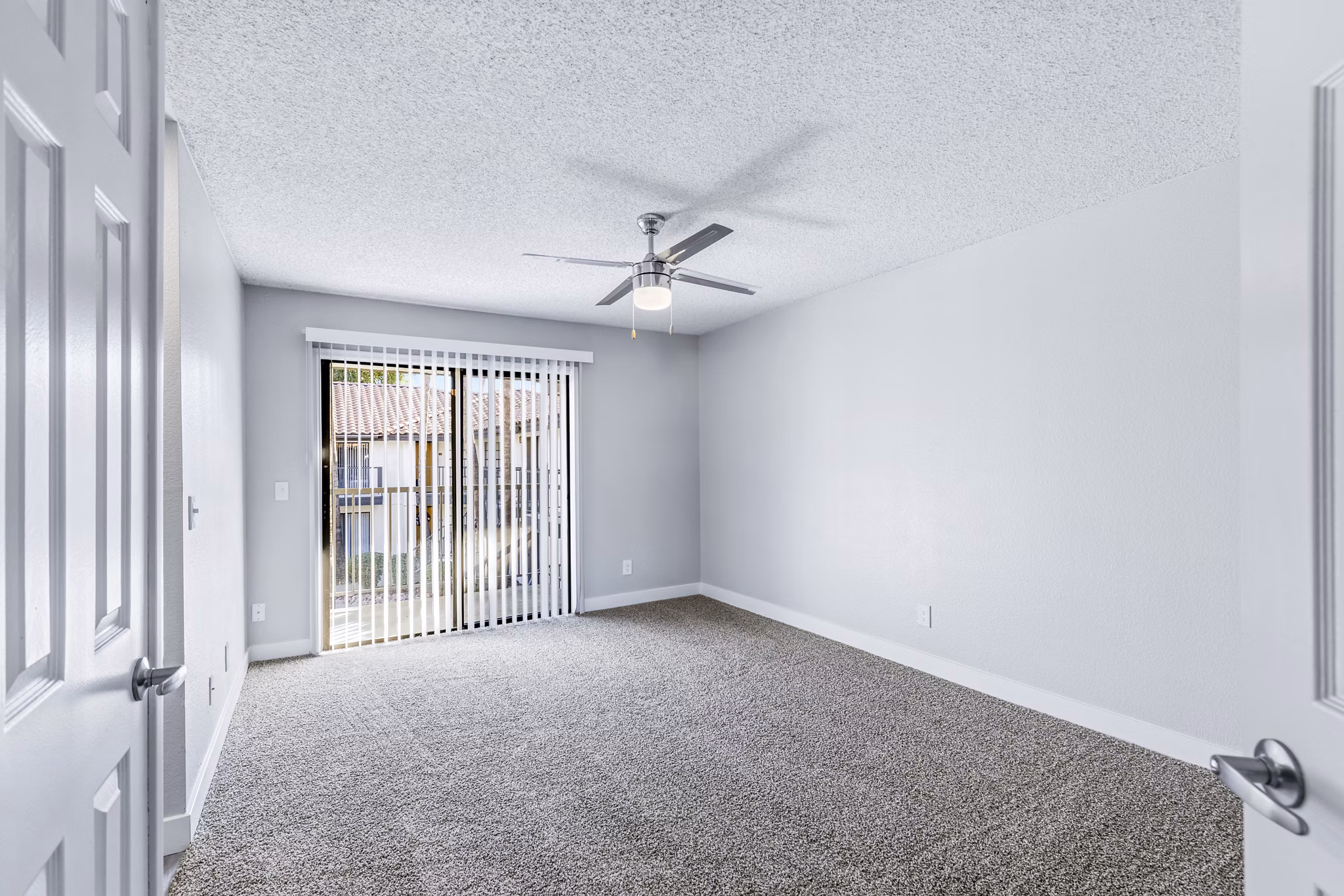 Bedroom with modern decor and natural light at Fountain Palms Apartments in a Greystar-managed community
