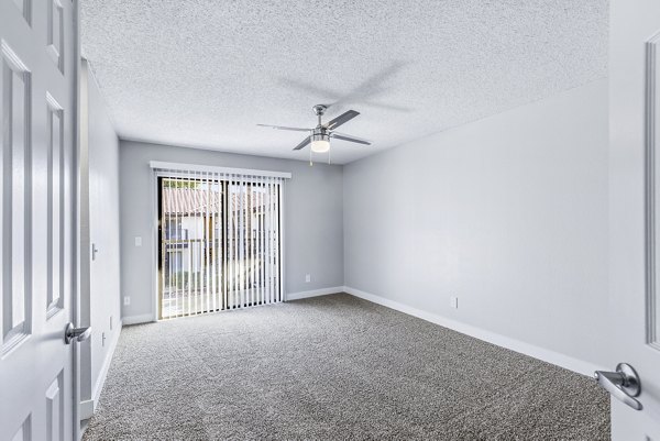 Bedroom with modern decor and natural light at Fountain Palms Apartments in a Greystar-managed community
