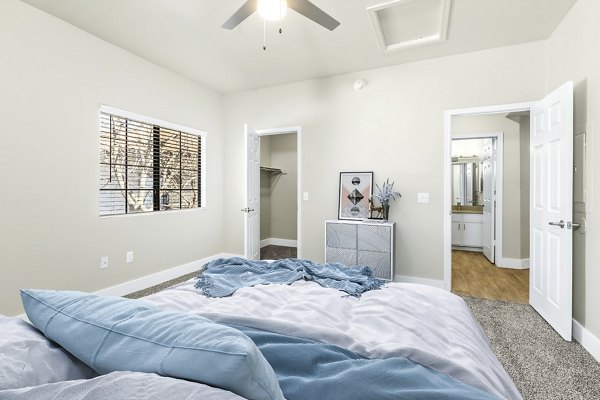 Cozy bedroom featuring modern decor at Fountain Palms Apartments