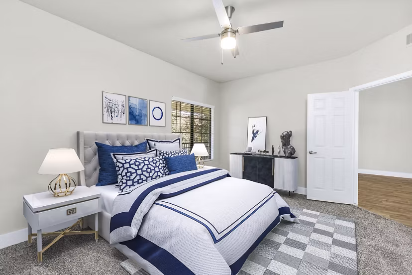 Spacious bedroom with modern decor at Fountain Palms Apartments