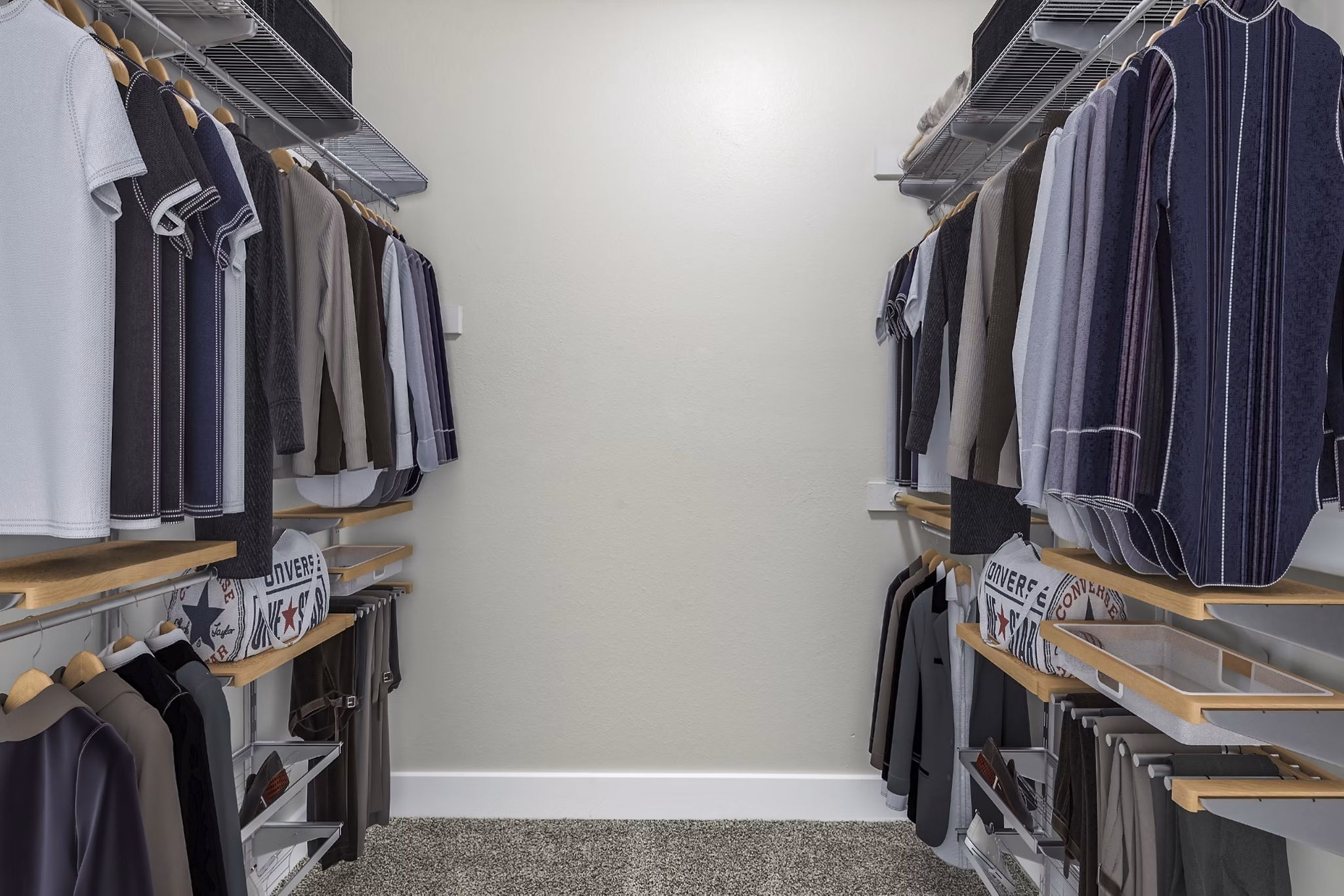 Modern bedroom closet with sliding doors at Fountain Palms Apartments, featuring ample storage space and sleek design