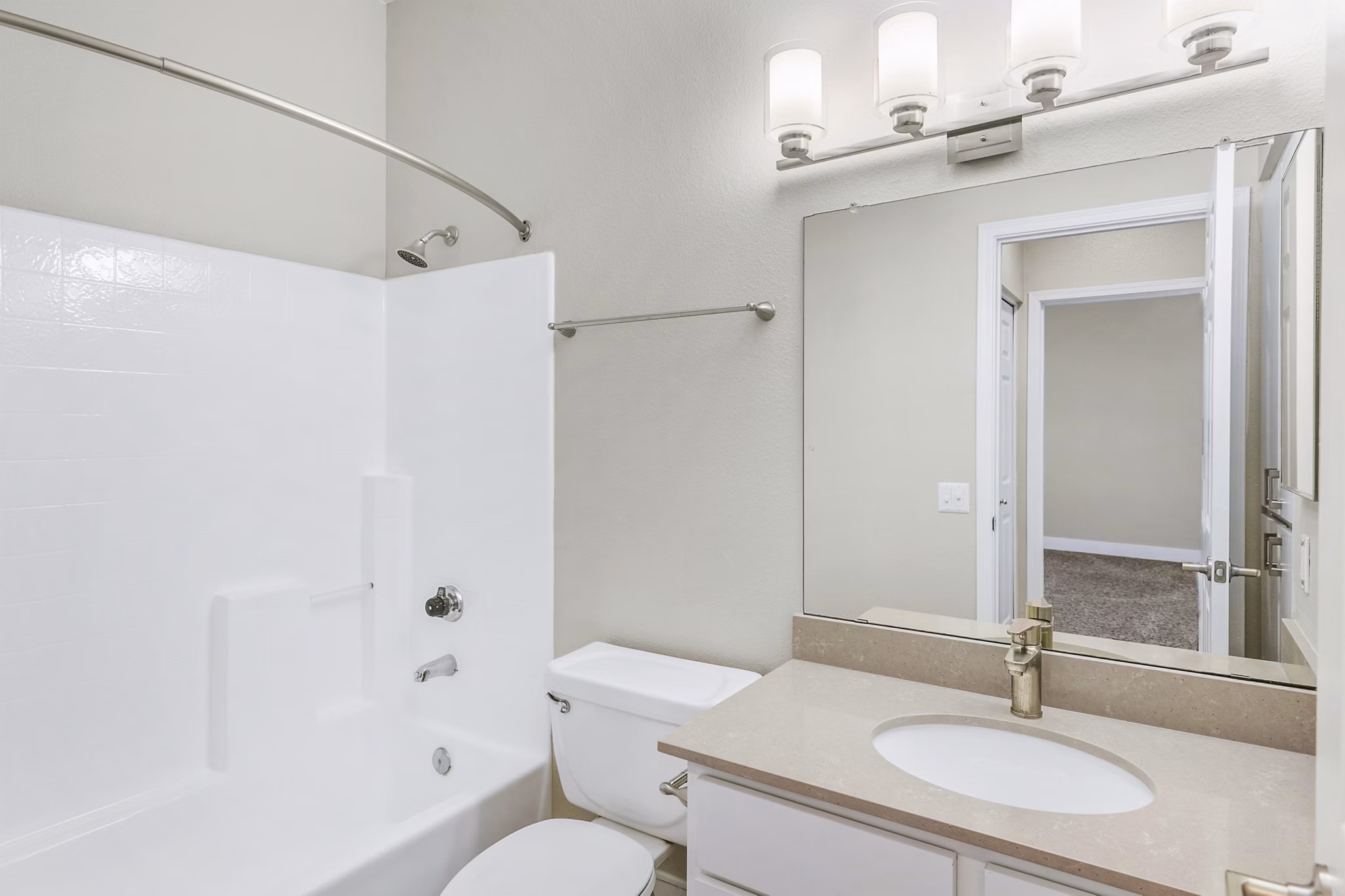 Spacious bathroom with modern fixtures at Fountain Palms Apartments in sunny location