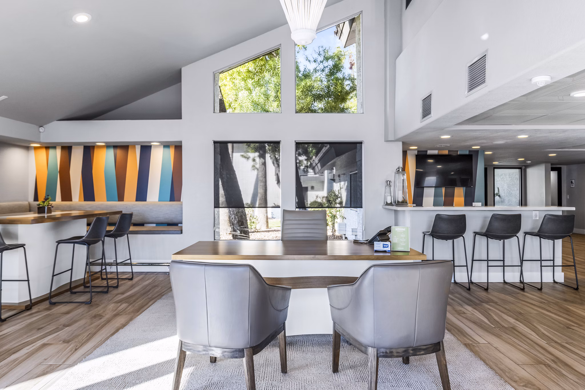 Stylish clubhouse and leasing office at Fountain Palms Apartments offering modern amenities for residents