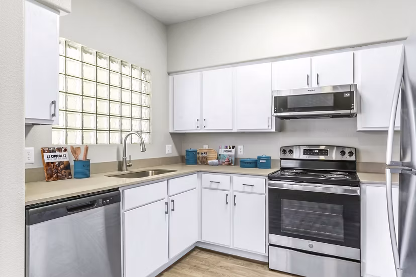 Modern kitchen featuring stainless steel appliances at Fountain Palms Apartments