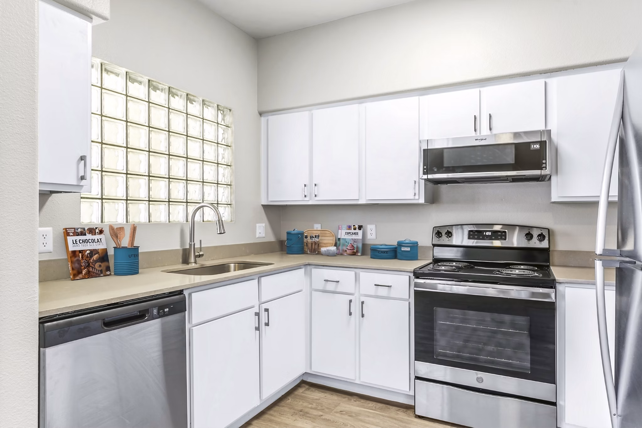 Modern kitchen featuring stainless steel appliances at Fountain Palms Apartments