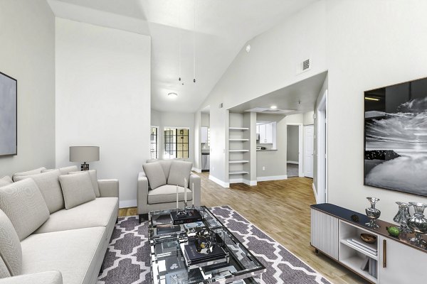 Spacious living room with modern furnishings at Fountain Palms Apartments, luxury rental by Greystar
