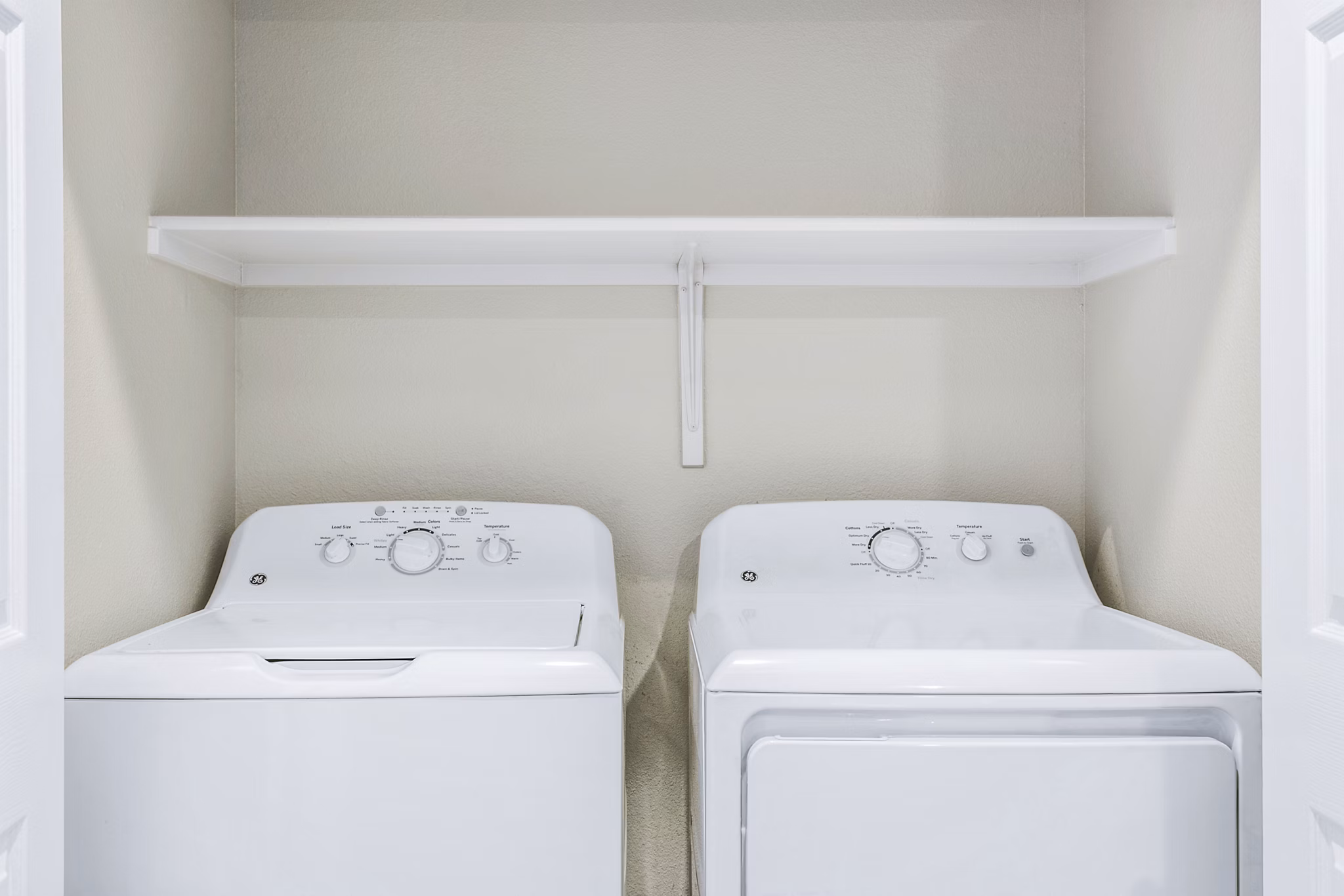 Laundry room with modern appliances at Fountain Palms, Greystar luxury apartments in Phoenix