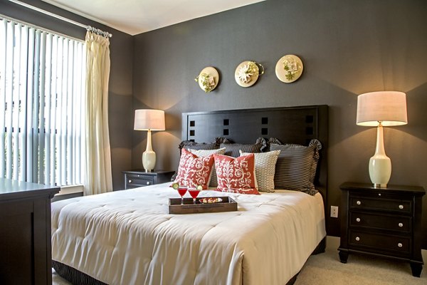 Cozy bedroom with modern decor at Sawyer Heights Lofts luxury apartments