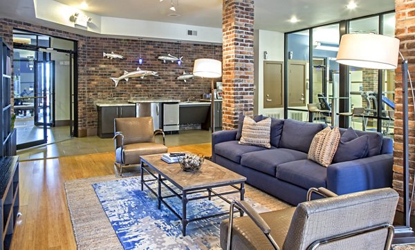 Stylish clubhouse with modern furnishings at Sawyer Heights Lofts luxury apartments