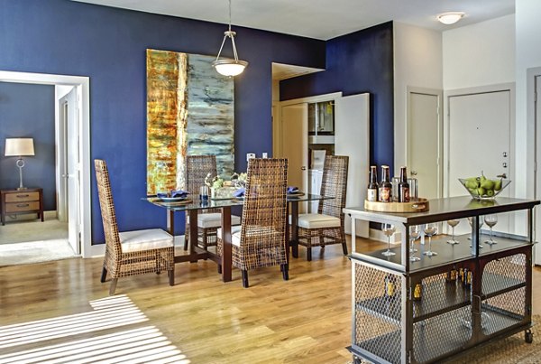 Dining room featuring elegant lighting and modern furnishings at Sawyer Heights Lofts Luxury Apartments in Houston