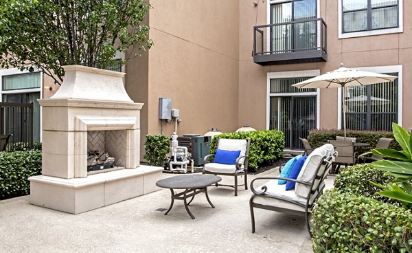 Patio with outdoor seating at Sawyer Heights Lofts Luxury Apartments, ideal for relaxation and entertaining