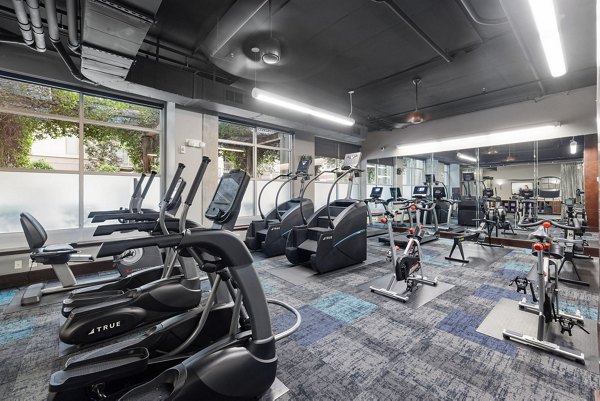 Fitness center with modern equipment at The Devon Four25 Apartments