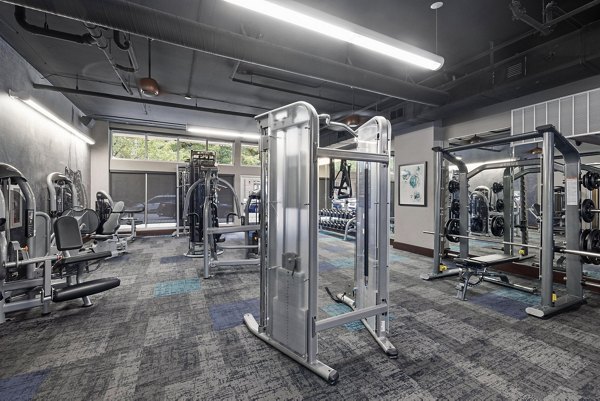 Fully equipped fitness center at The Devon Four25 Apartments with modern gym amenities