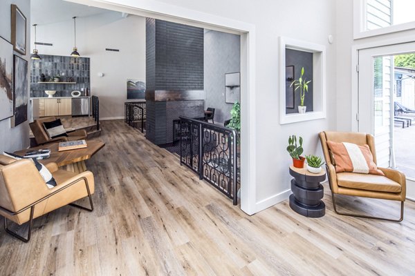 Community clubhouse with modern lounge seating at Avana at Happy Valley Apartments