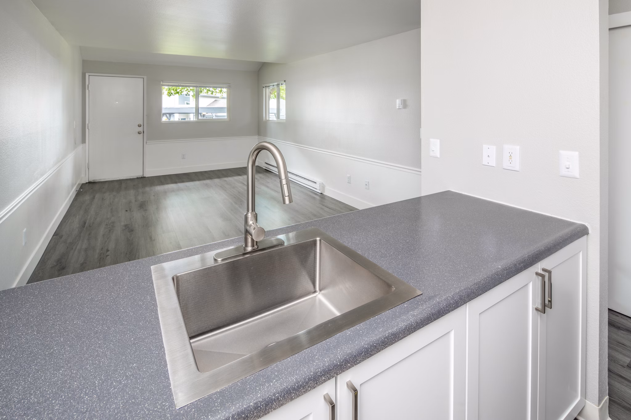 Modern kitchen with stainless steel appliances at Avana at Happy Valley Apartments, a luxury living space by Greystar